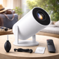 Unboxed White outdoor light fixture with remote control on a wooden table