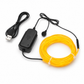 Yellow LED strip with black power adapter and USB cable on a white background