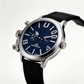 Watch with black strap and blue dial on a white background