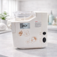 White appliance with floral designs and &