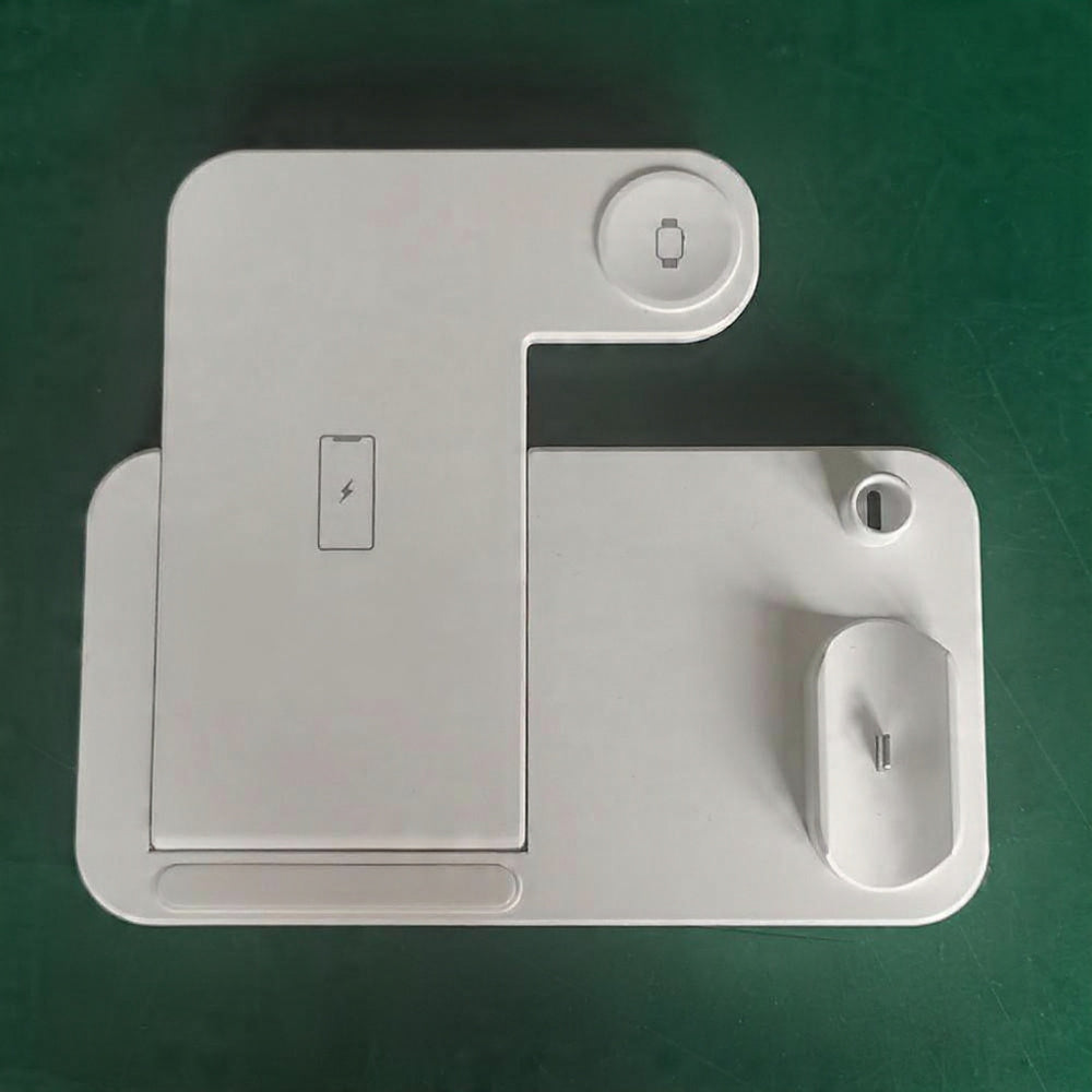 White electronic device with various ports on a green background