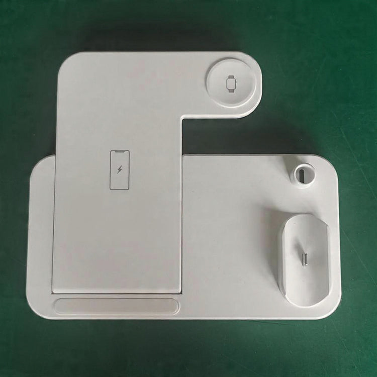 White electronic device with various ports on a green background