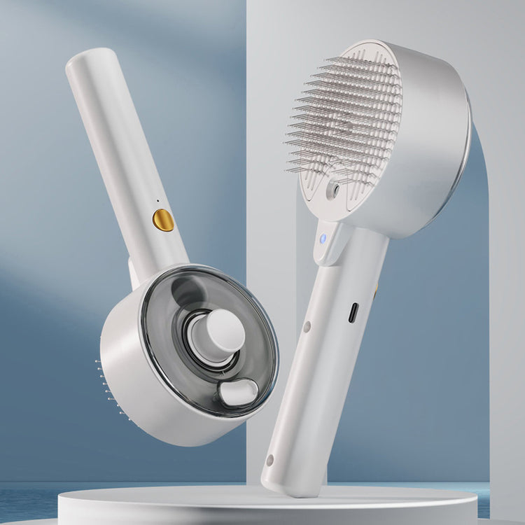 White handheld cleaning brush with bristle head on a gray background