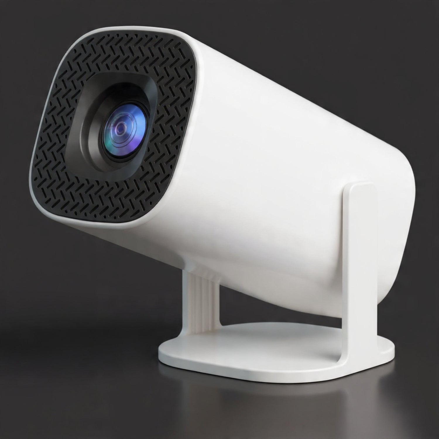 White portable projector camera on a wooden surface with a blurred black indoor background