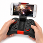 Gaming controller with smartphone holder displaying a game on a white background