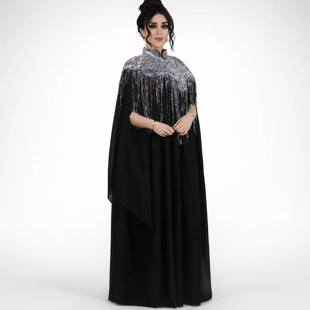 women's ethereal chiffon gown with tassels in black with silver embellishments and fringes, front view