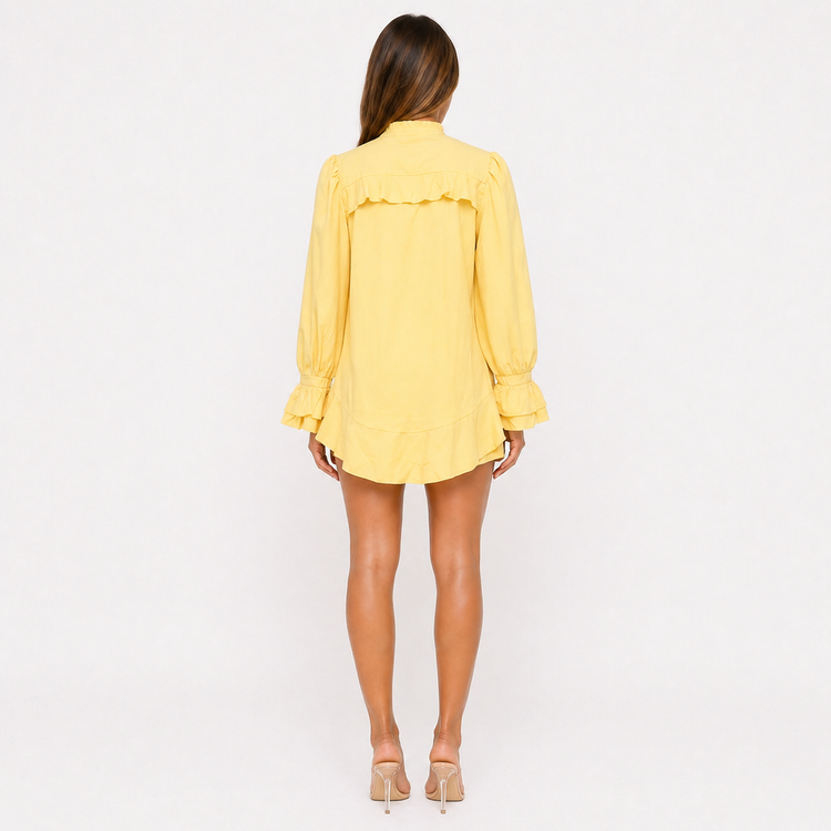 Person wearing a yellow dress on a white background