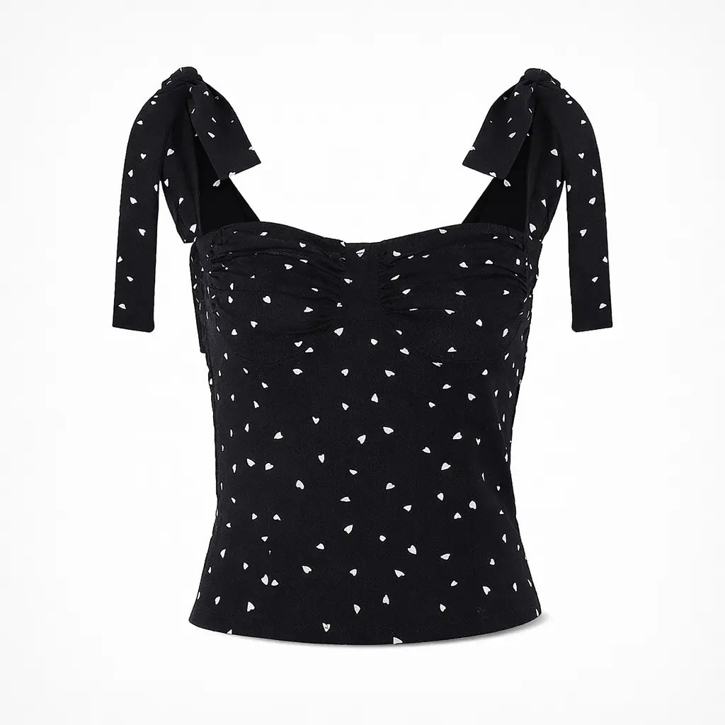 Women's polka dot lace-up tank top black with white dots front view