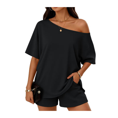 Black off-shoulder top and shorts set on a white background