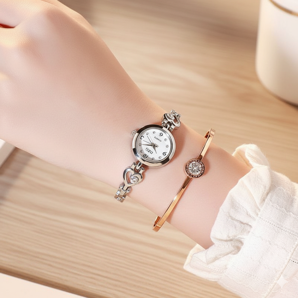 Wrist with silver watch and rose gold bracelet on a wooden surface