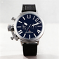 Wristwatch with black strap and blue dial on a white background