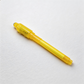 Yellow pen on a white background