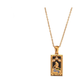 gold tarot necklace with black and gold star design pendant