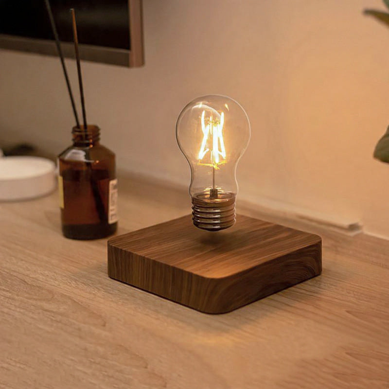 floating electric light bulb above wooden board for interior decorations in the room on the floor