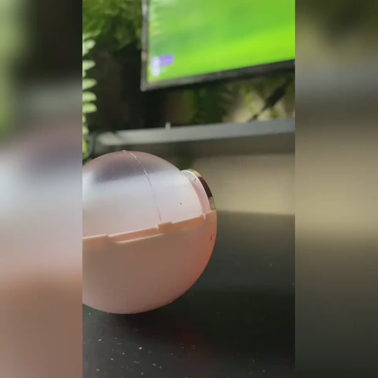 pink washable lint roller in use