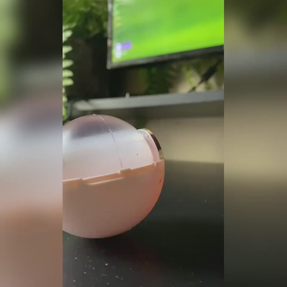 pink washable lint roller in use