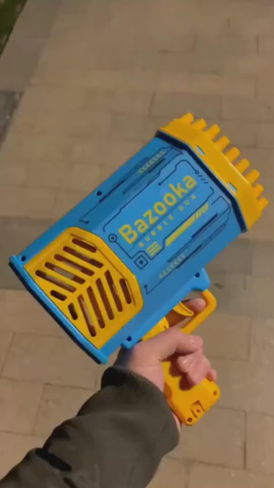 Bazooka bubble gun with bubbles in a park setting, including bubble solution and charger. Yellow