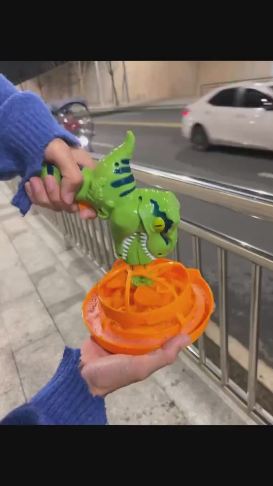 Green dinosaur-shaped bubble gun with bubbles in a grassy outdoor setting
