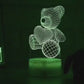 3D teddy bear lamp with cracked texture design on a table. 3D Acrylic USB LED Night Lamp – Neon Sign
