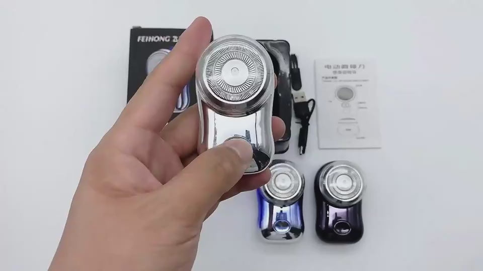 Green electric shaver on a light gray background UNBOXING AND TESTING